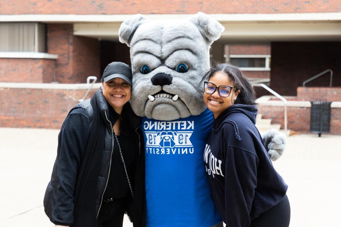 student with parent on family day